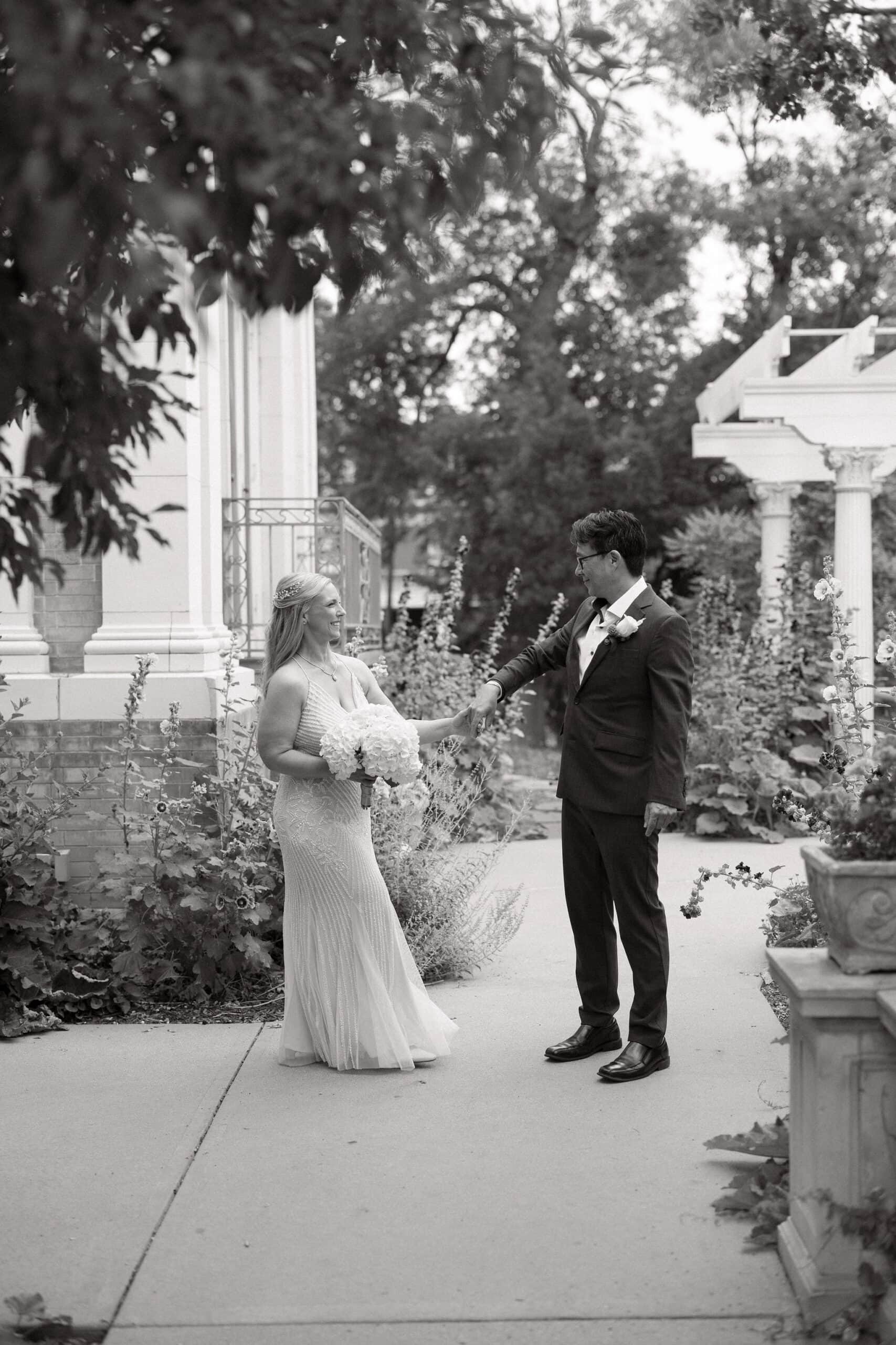 Portraits of Bride and Groom in the gardens at their Grant Humphrey's Mansion Wedding on a cloudy June morning.