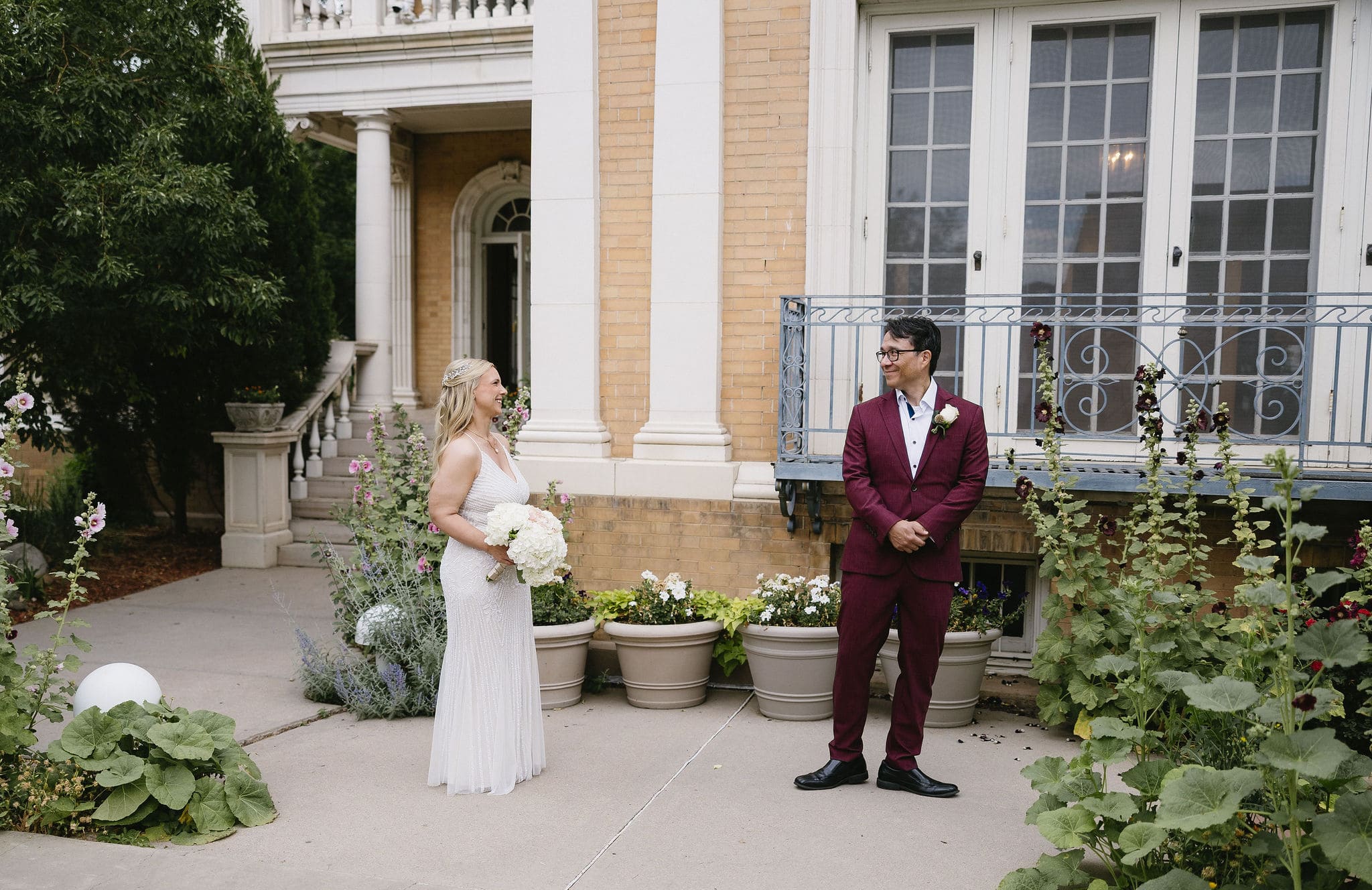 Romantic first look photos of Bride and Groom in the gardens at their Grant Humphrey's Mansion Wedding 