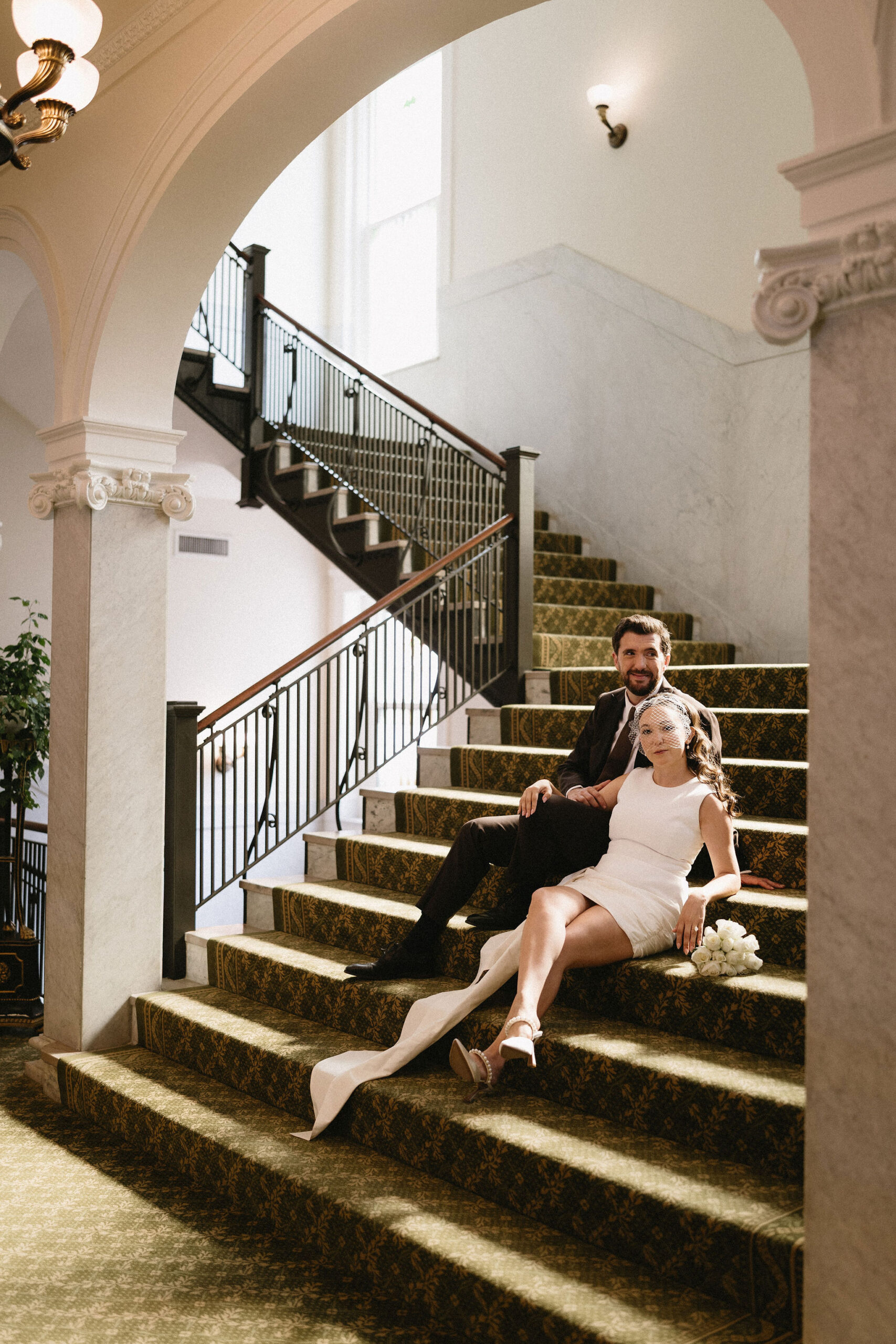 Wedding Portraits at The Capital Hotel in Little Rock Arkansas. Bride wears a bird cage veil.