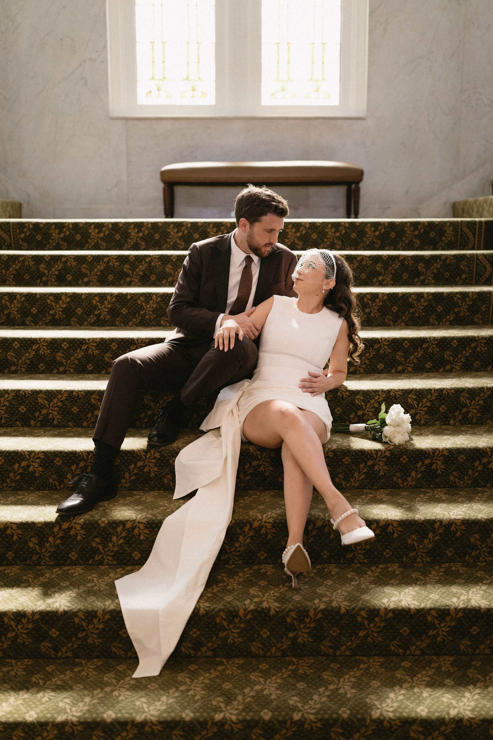 Wedding Portraits at The Capital Hotel in Little Rock Arkansas. Bride wears a bird cage veil.