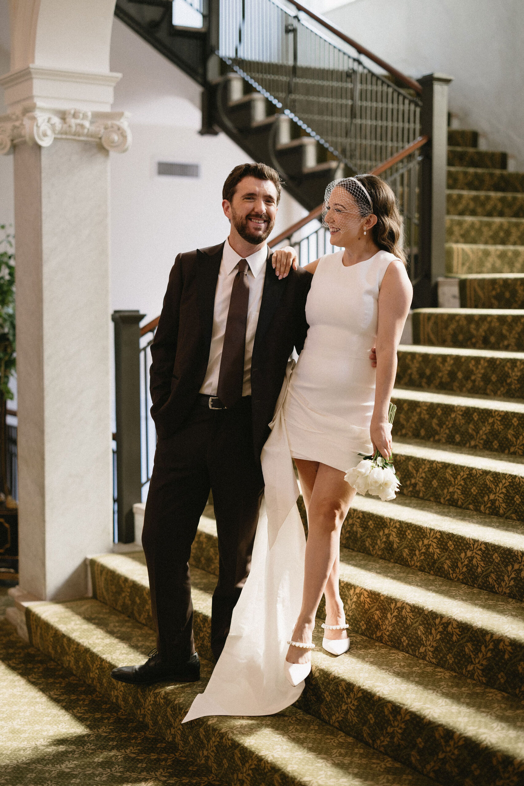 Wedding Portraits at The Capital Hotel in Little Rock Arkansas. Bride wears a bird cage veil.