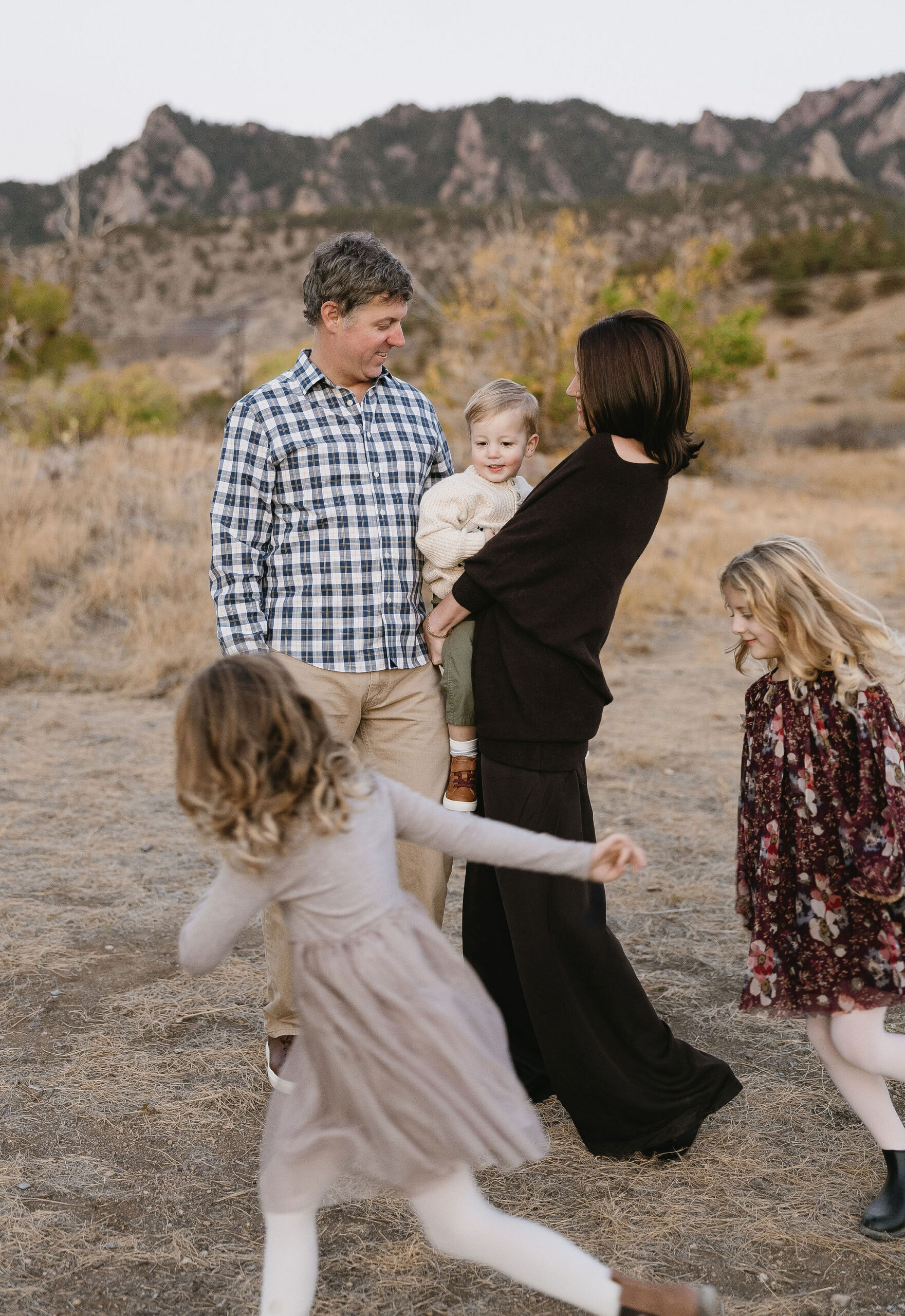 Cute portraits of a family at south mesa trailhead during october fall colors