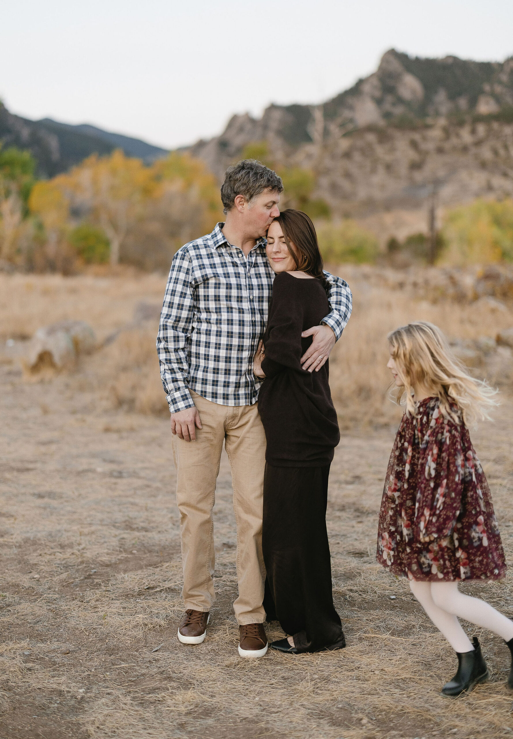 Cute portraits of a family at south mesa trailhead during october fall colors