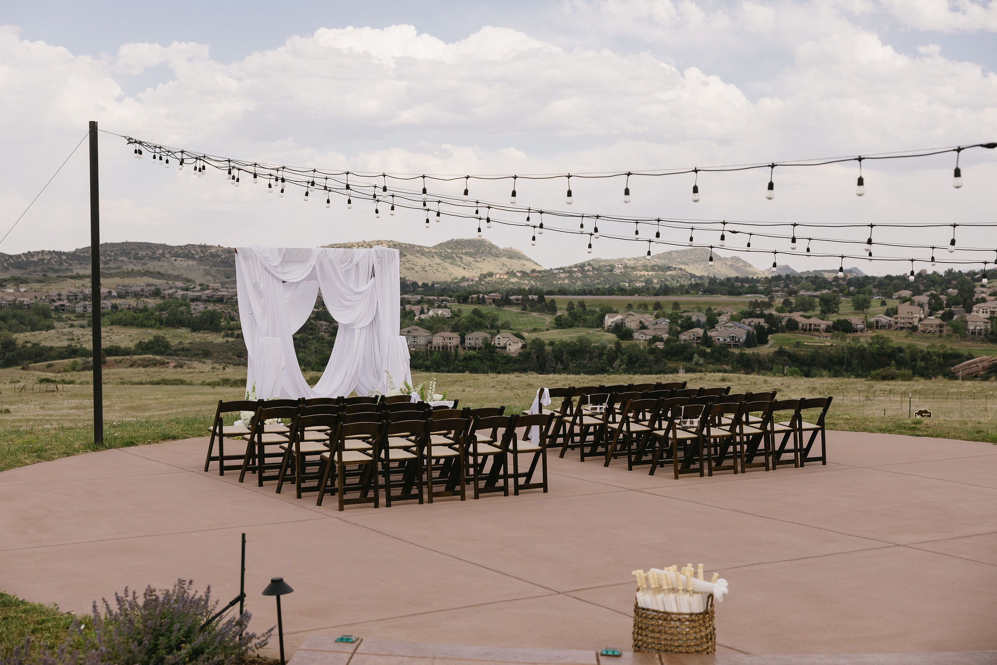 Wedding Ceremony set up at The Fort Restaurant in Morrison, Co. It overlooks the foothills and is a stunning spot for a denver area wedding