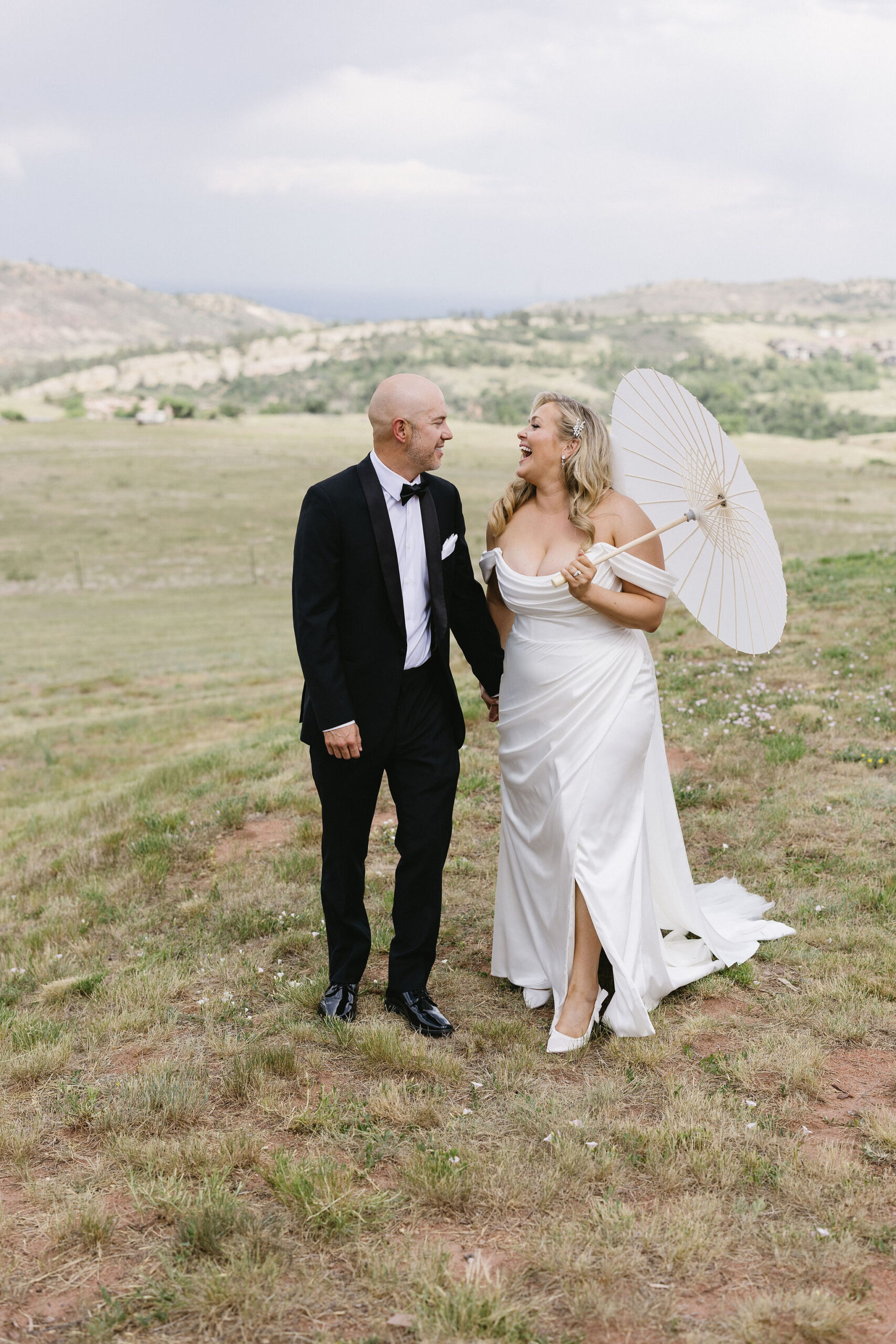 Bride and groom romantic and classy portraits in the bright Colorado sunshine at The Fort Restaurant in Morrison, CO.