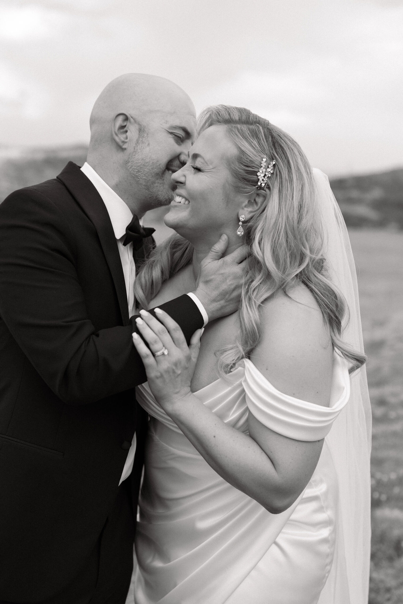 Bride and groom romantic and classy portraits in the bright Colorado sunshine at The Fort Restaurant in Morrison, CO.